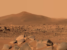 Hill called Santa Cruz rising above a rock-strewn Martian plain