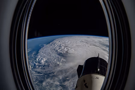 Hurricane Milton's eye and spiral of clouds over the Gulf of Mexico, seen from orbit